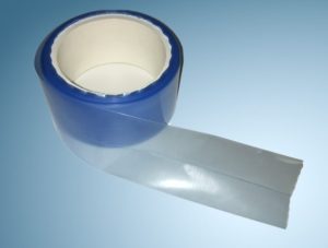 image of blue tinted plastic tubing on a roll as an example of simple poly packaging