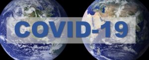 image of the world with text "COVID-19"