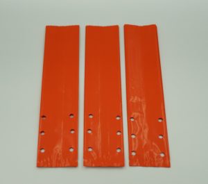 image of 3 orange samples of a plastic grow bag from TDI Custom Packaging, Inc.