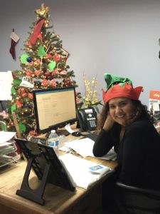 Image of office staff member during Christmas time.