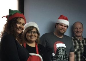 Image of office staff with during Christmas time.
