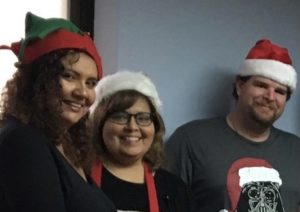 Image of office staff during Christmas time.