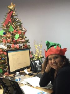 Image of an office member during Christmas time.
