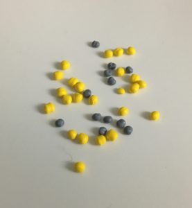 image of resin particles as used in custom plastic packaging by TDI