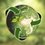 Image of a green globe with recycling arrows