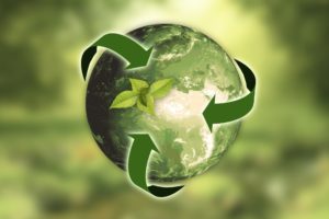 Image of a green globe with recycling arrows
