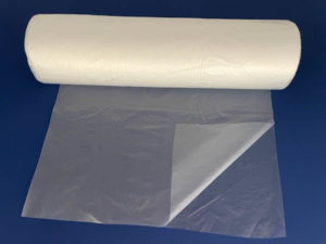 image of clear centerfold sheeting on a roll as an example of simple poly packaging