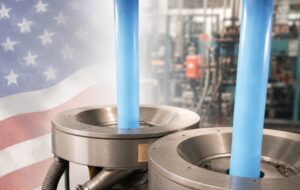 image of poly film extruders at TDI Custom Packaging plant with a faded American flag