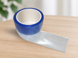 image of blue custom perforated poly film on a roll, manufactured by TDI Custom Packaging